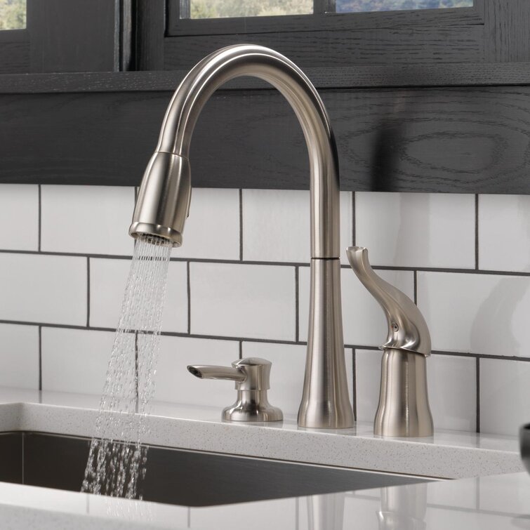 Kitchen sink faucet with soap deals dispenser